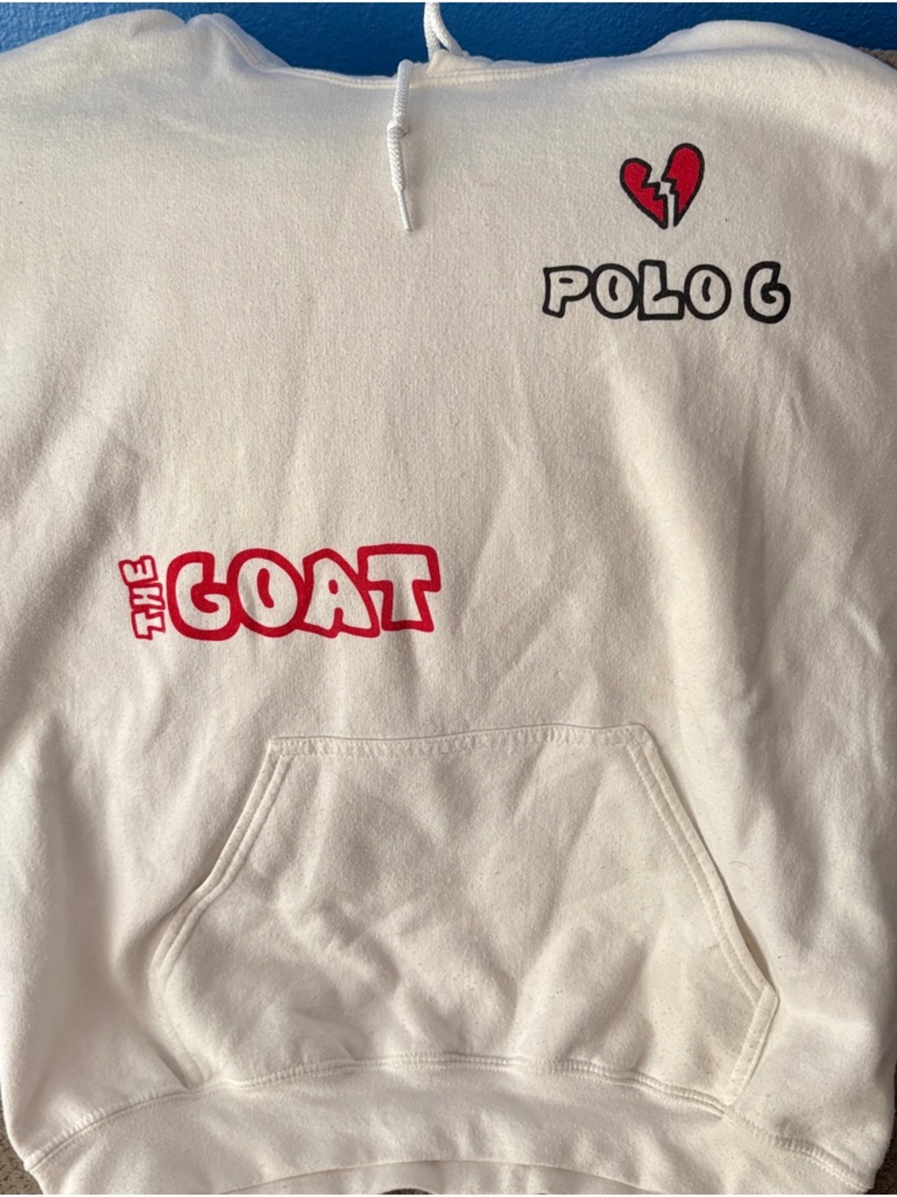Vibrant, Polo G hoodie with multi design screen print.